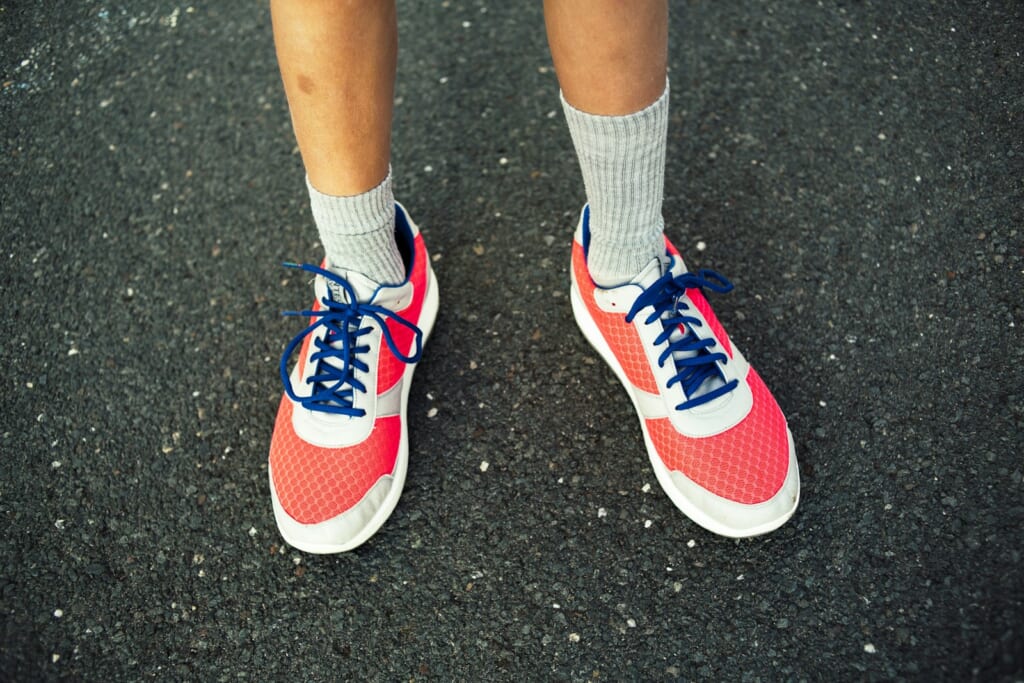 red-and-white running shoes