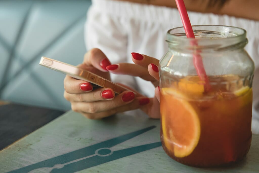 clear glass jar filled with fruit juice