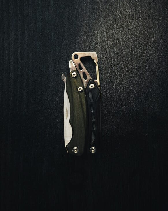 black and silver folding knife