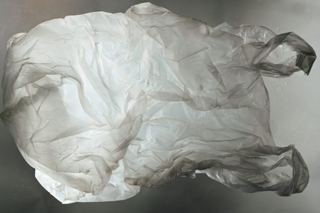 a crumpled piece of paper floating in the air